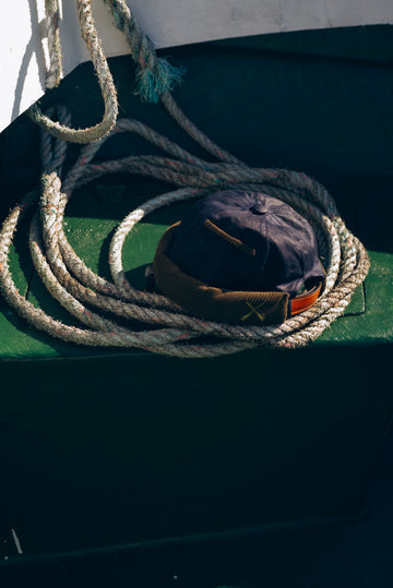 MIKI DOCKER HAT DARK BLUE WAXED COTTON